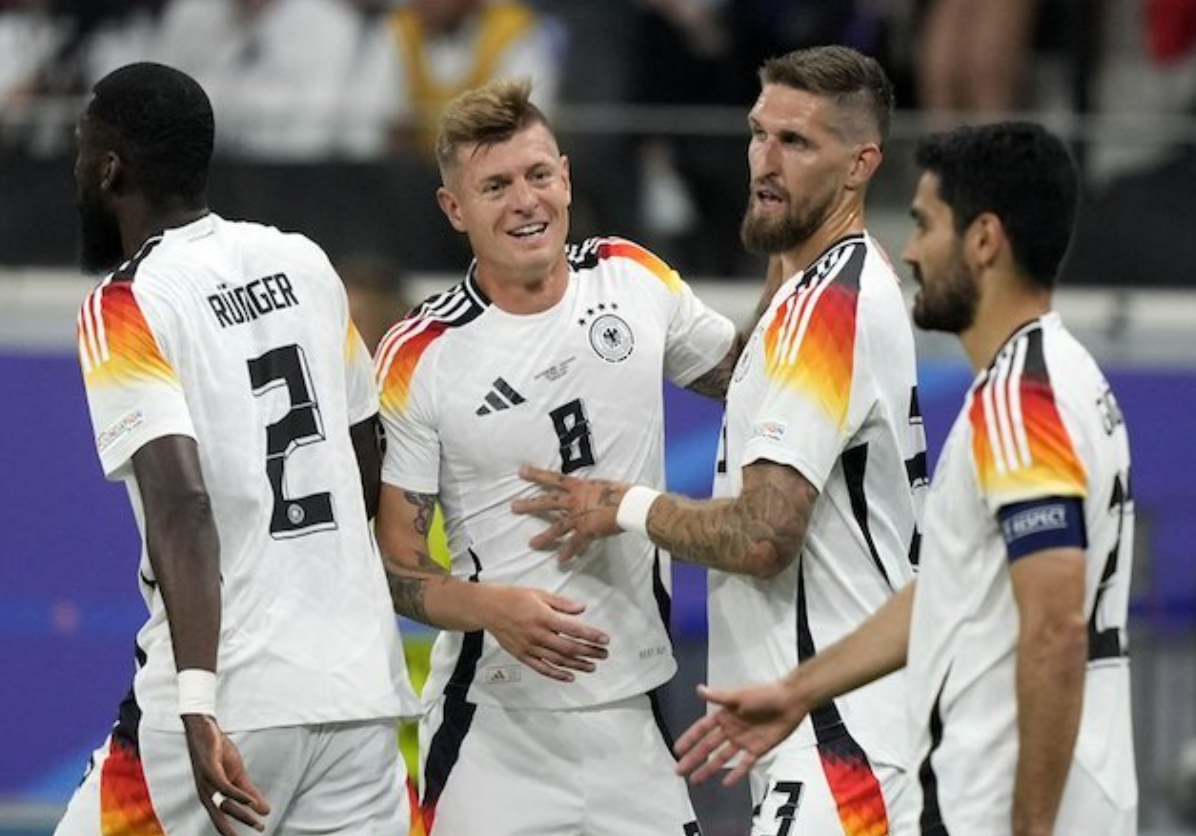 Para pemain Jerman saat melakukan selebrasi. (c) AP Photo/Martin Meissner