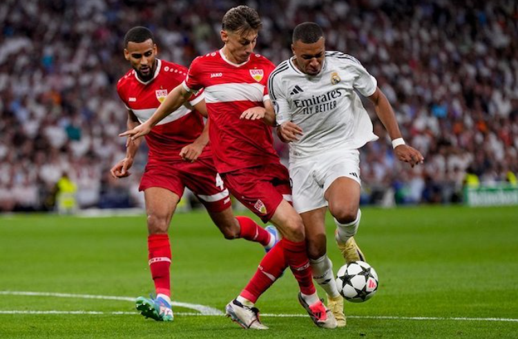 Duel Kylian Mbappe di laga melawan Stuttgart di Liga Champions 2024/25. (c) AP Photo/Manu Fernandez